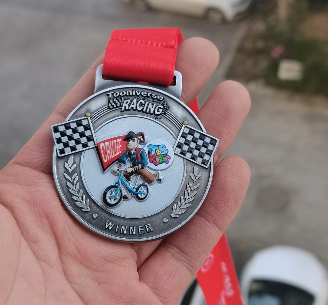 เหรียญผู้พิชิต Tooniverse Racing
